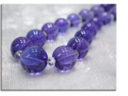 Tanzanite with faceted diamond beads