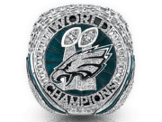 Jason of Beverly Hills Crafts Spectacular Super Bowl Rings for the LIX NFL Champions, the Philadelphia Eagles: Fly, Eagles, Fly—With 12 Carats of Bling! Philadelphia Eagles NFL championship ring with logo and engraved text.