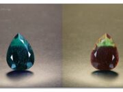 Lotus Gemology: Emerald and Alexandrite in the same stone! Two pear-shaped gemstones showing different colors under varying light conditions.