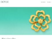 Seaman Schepps at Doyle’s August Auction: Why Fine Jewelry isn’t Always about Emeralds, Rubies, Sapphires, and Diamonds Elegant gold flower-shaped jewelry piece on turquoise background.