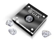 Holiday 24-Hour Diamond Services at GIA’s Gem Lab A GIA-certified diamond with loose diamonds beside it.